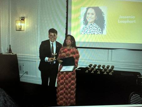 Jessenia laughing as she receives an award